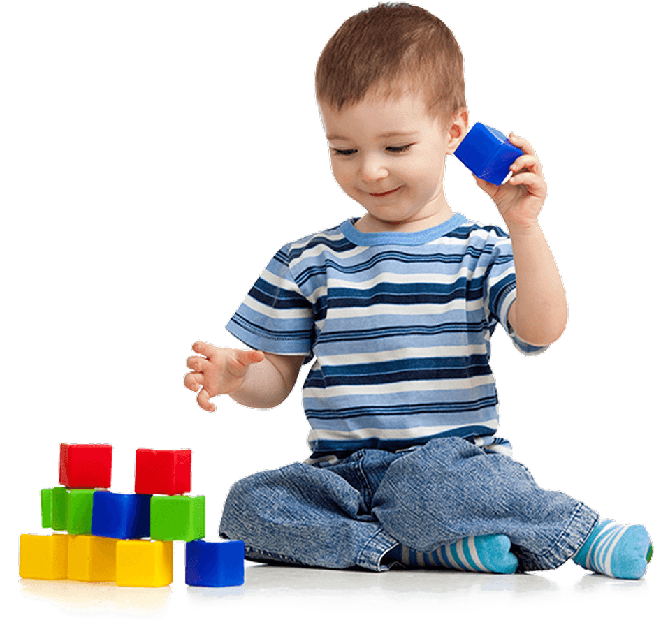 Preschooler playing with colorful blocks