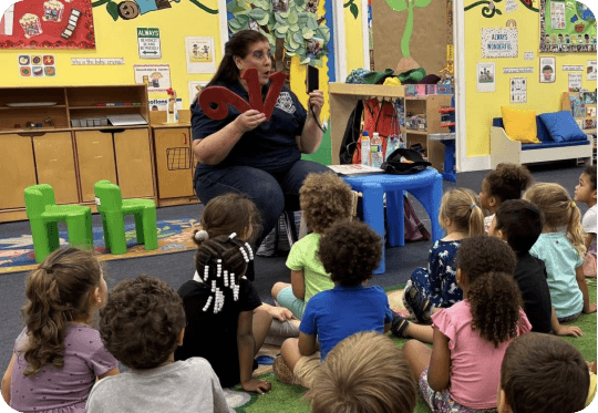 Teacher with children