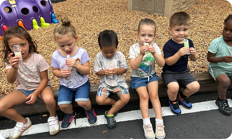 Children wearing sprout academy shirts